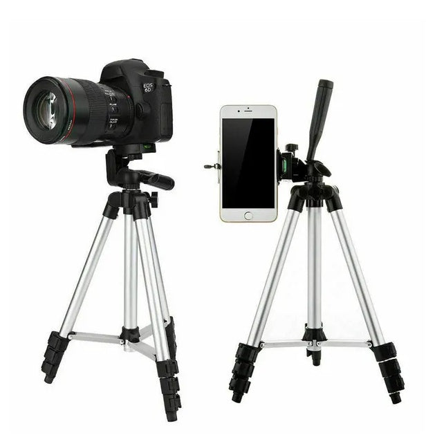 Camera and smartphone on tripods with adjustable phone holders on a white background